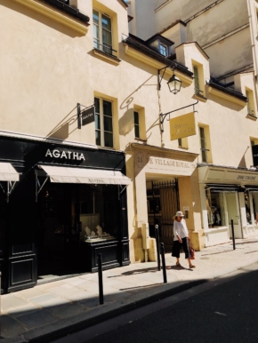 woman-walking-away-front-store-1426720